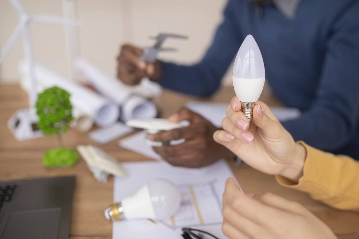 colleagues-working-together-environment-project-close-up